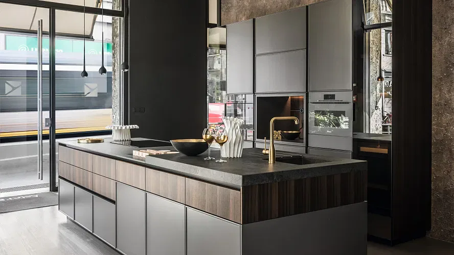 Modern kitchen interior with sleek design and city view