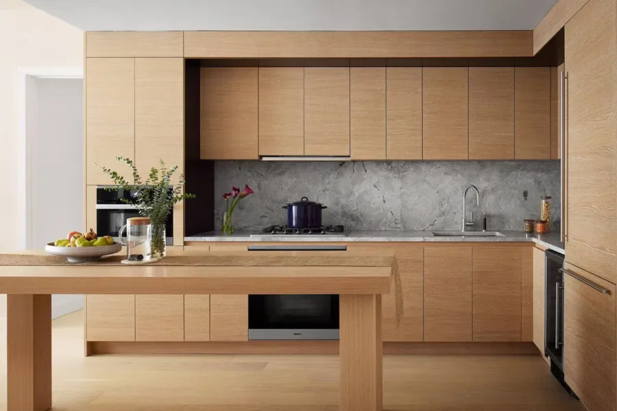Modern kitchen with wooden cabinets and marble backsplash