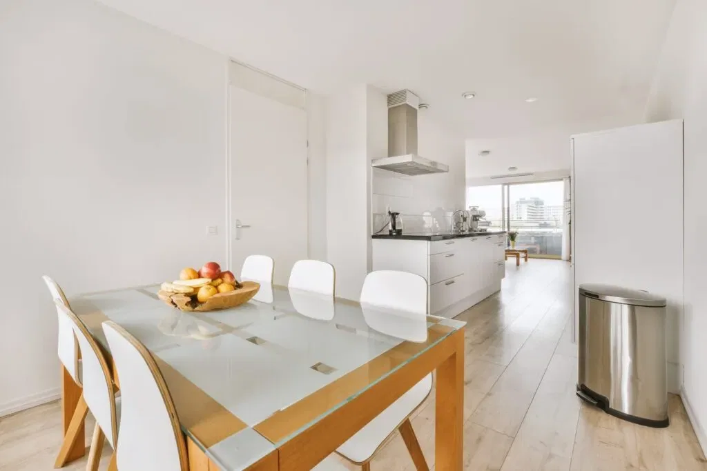 Modern kitchen with dining area and natural light