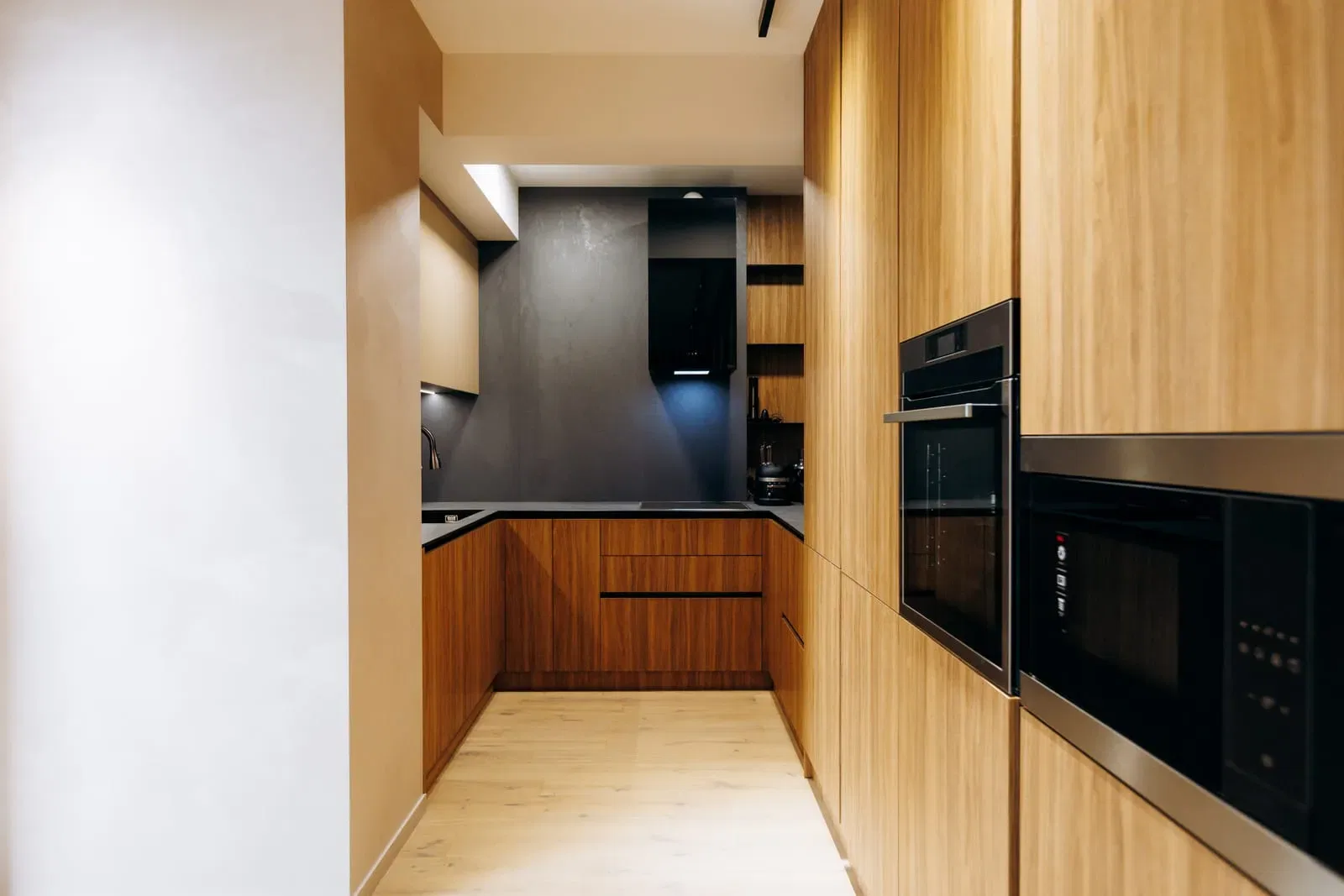 Modern kitchen interior with wooden cabinets and appliances