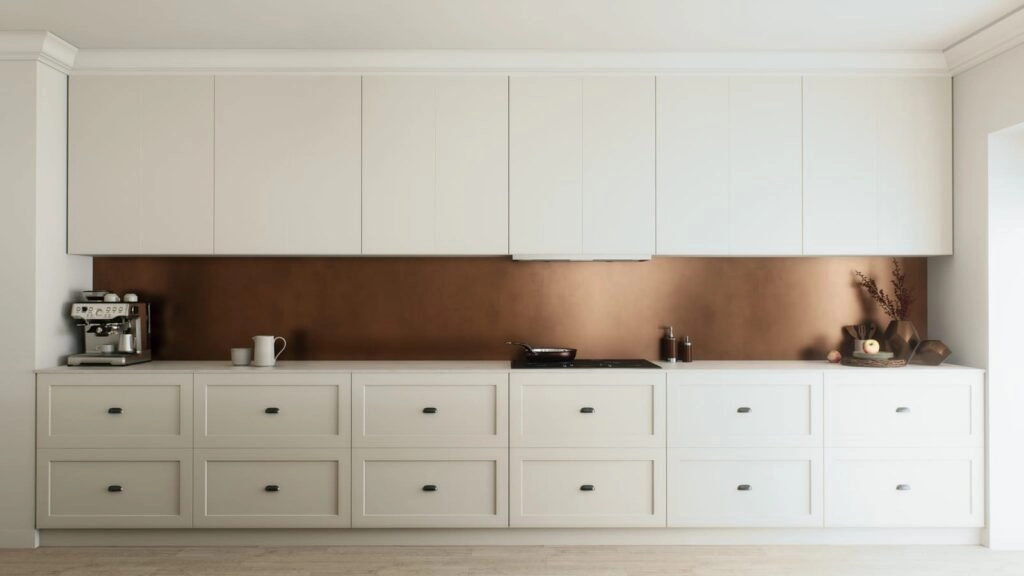 Modern kitchen with white cabinets and copper backsplash
